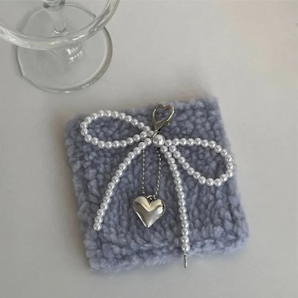 ZAKOL Pearl Bowknot Heart Keychain For Women - Image 6